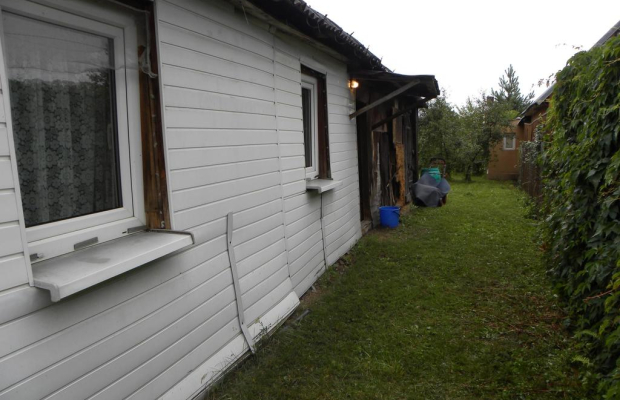Dom z drewna przy Wiśle ul. Modrzycka w Dęblinie.