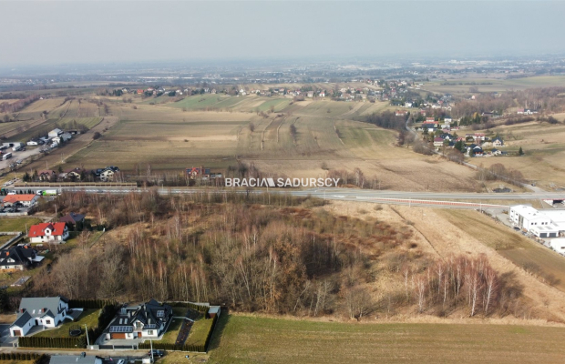 Działka inwestycyjna przy drodze wojewódzkiej