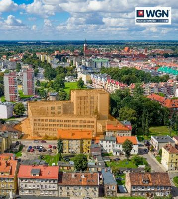 Elbląg, budynki biurowe, 9040 m2, sprzedam 6 000 000 zł, netto.  
  
Na sprzedaż kompleks budynków biurowo-technicznych z parki
