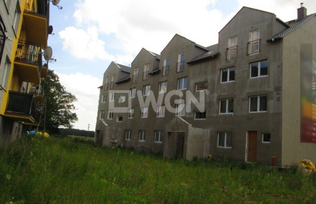 Chocianów, działka inwestycyjna, 3233 m2, zabudowana budynkiem wielorodzinnym, sprzedam, 1 990 000 zł. 
  
Budynek nowy, w stan