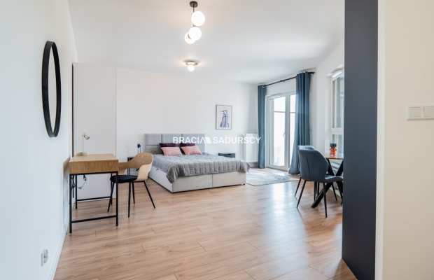 Nowoczesny apartament z balkonem i parkingiem.