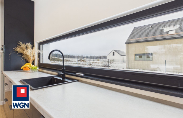 Dom jednorodzinny parterowy - projekt `Ekonomiczny 4T` , Gorzyca, gm. Lubin  
  
Ten dom łączy funkcjonalny projekt parterowy z