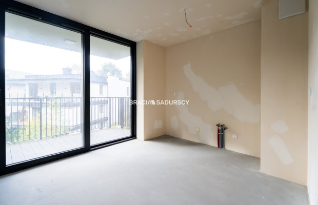 Nowoczesny jasny apartament w otoczeniu zieleni 