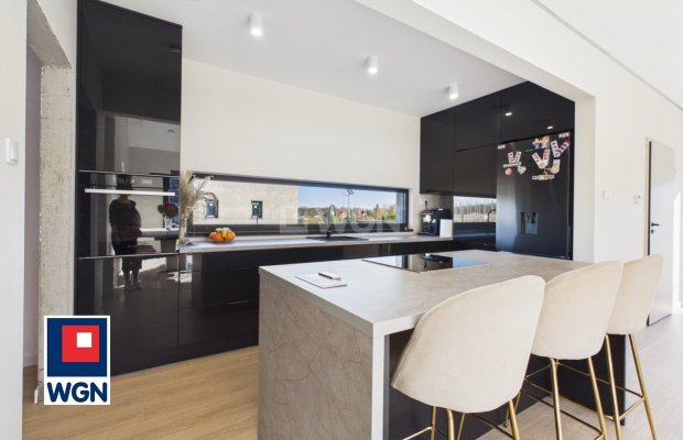 Dom jednorodzinny parterowy - projekt `Ekonomiczny 4T` , Gorzyca, gm. Lubin  
  
Ten dom łączy funkcjonalny projekt parterowy z