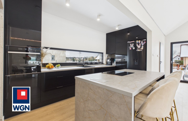 Dom jednorodzinny parterowy - projekt `Ekonomiczny 4T` , Gorzyca, gm. Lubin  
  
Ten dom łączy funkcjonalny projekt parterowy z