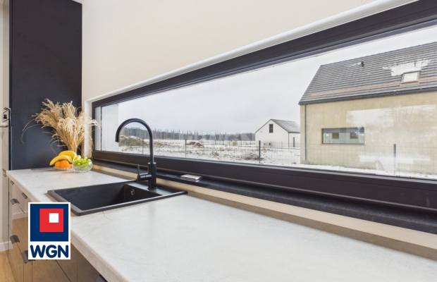 Dom jednorodzinny parterowy - projekt `Ekonomiczny 4T` , Gorzyca, gm. Lubin  
  
Ten dom łączy funkcjonalny projekt parterowy z