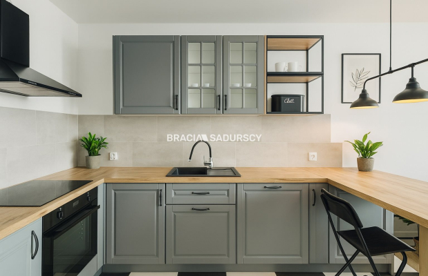 Sprzedam mieszkanie z ogrodem oraz garażem