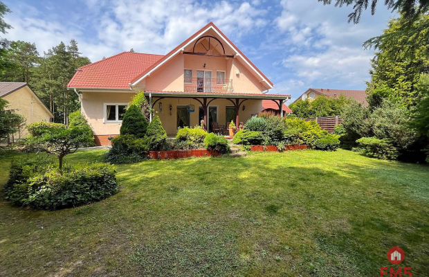 Dom z ogrodem Porosły