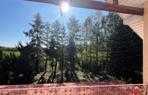 Dom z ogrodem Porosły