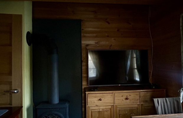 Drewniany dom z działką, sauną i garażem