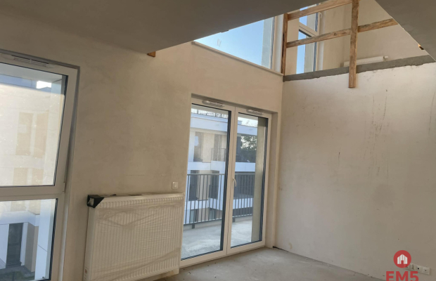 Apartament z antresolą i tarasem na dachu .