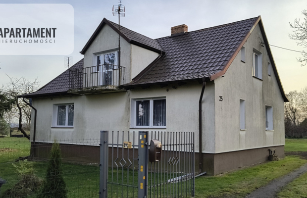 Dom z zabudowaniami na działce 1,24 ha