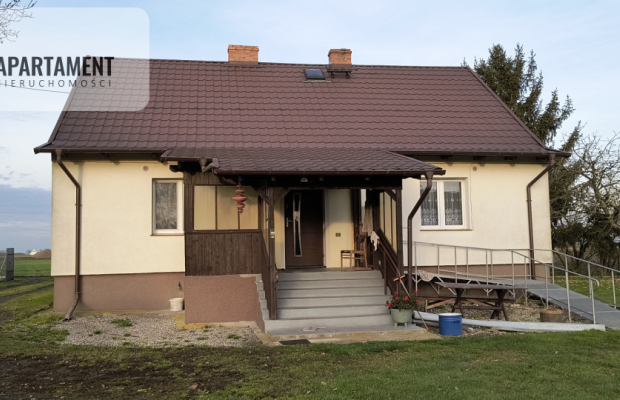 Dom z zabudowaniami na działce 1,24 ha