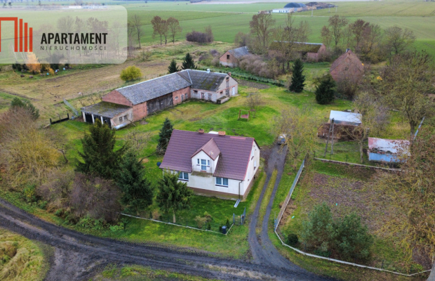 Dom z zabudowaniami na działce 1,24 ha