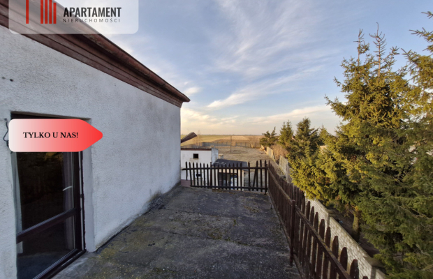 *Dom nieopodal Żnina