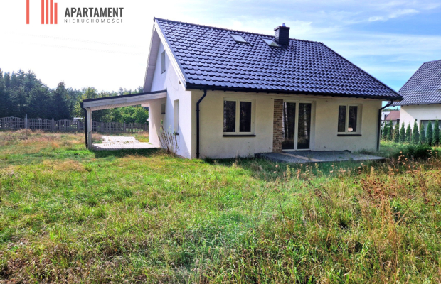 Dom jednorodzinny pod lasem.