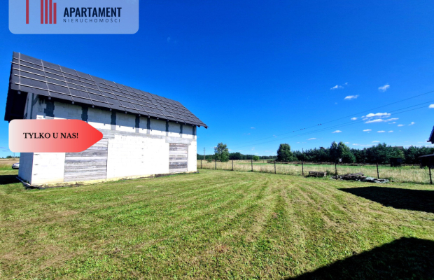 Budynek mieszkalny z domkami rekreacyjnymi.