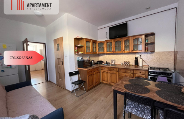 * Kamienica w centrum Kcyni