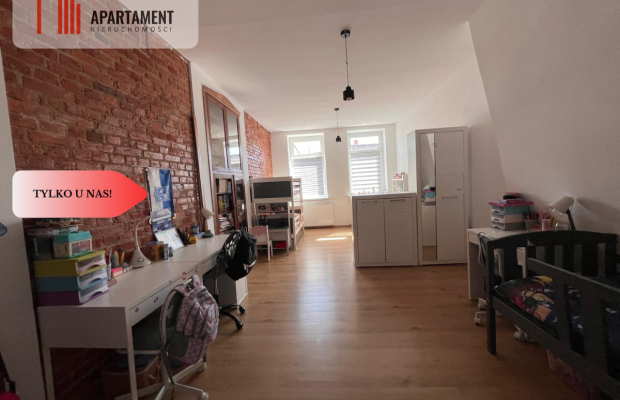 * Kamienica w centrum Kcyni