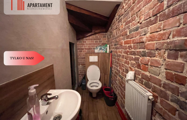 * Kamienica w centrum Kcyni