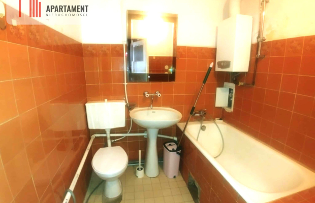 Z loggią do remontu w poszukiwanej lokalizacji