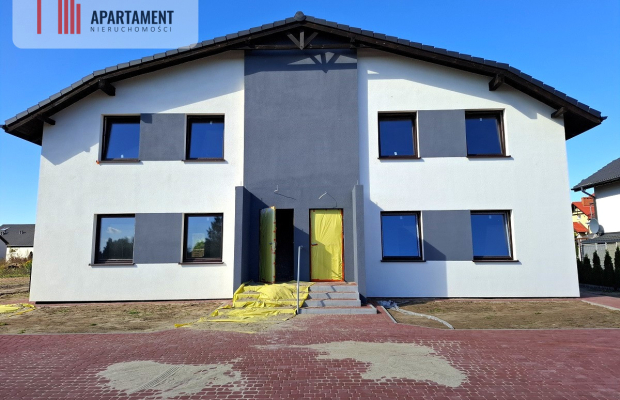 Mieszkanie w czterolokalowym budynku z ogródkiem