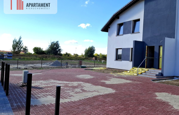 Mieszkanie w czterolokalowym budynku z ogródkiem