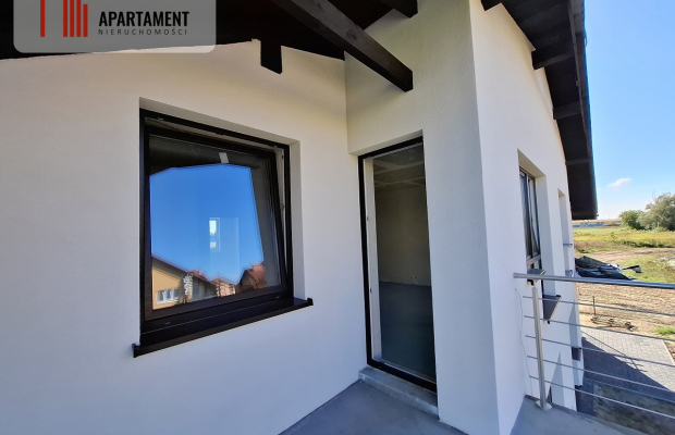 Mieszkanie w czterolokalowym budynku z ogródkiem