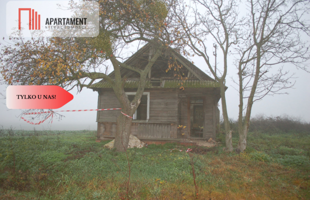 Działka budowlana z zabudowaniami Pigża.