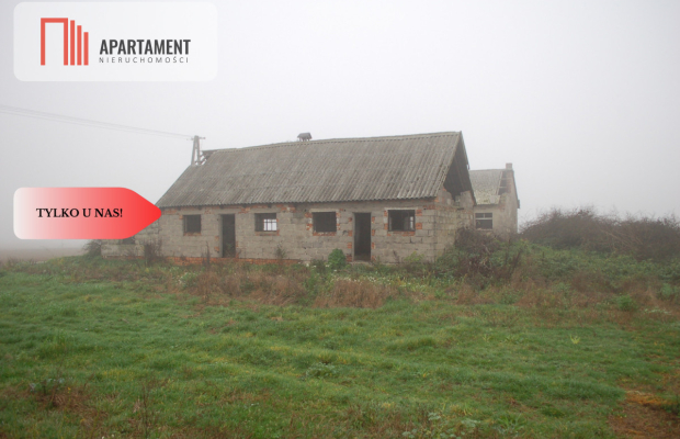 Działka budowlana z zabudowaniami Pigża.