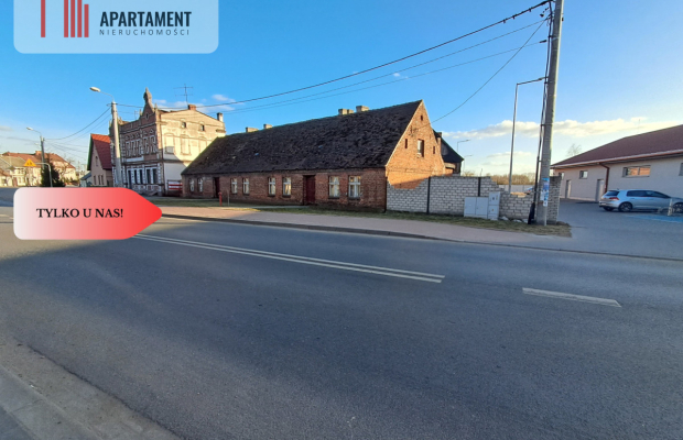 DZIAŁKA Z ZABUDOWANIAMI W CENTRUM OSIEKA NAD NOT.