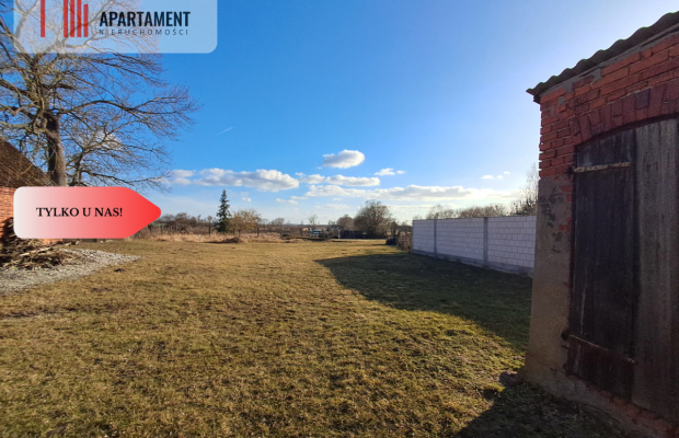 DZIAŁKA Z ZABUDOWANIAMI W CENTRUM OSIEKA NAD NOT.