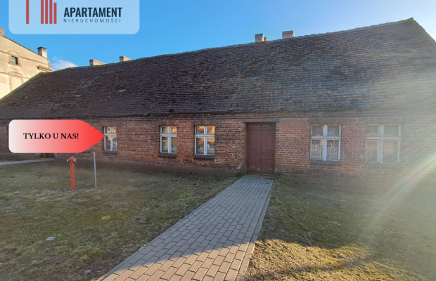 DZIAŁKA Z ZABUDOWANIAMI W CENTRUM OSIEKA NAD NOT.