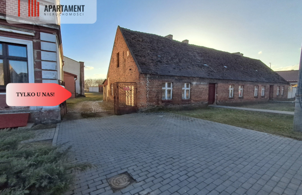 DZIAŁKA Z ZABUDOWANIAMI W CENTRUM OSIEKA NAD NOT.