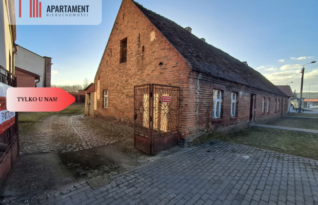 DZIAŁKA Z ZABUDOWANIAMI W CENTRUM OSIEKA NAD NOT.