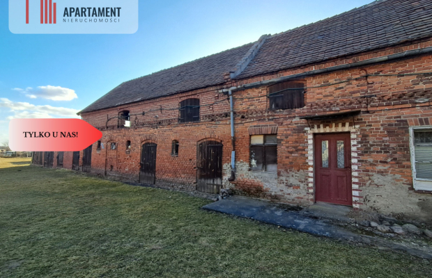 DZIAŁKA Z ZABUDOWANIAMI W CENTRUM OSIEKA NAD NOT.