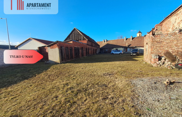 DZIAŁKA Z ZABUDOWANIAMI W CENTRUM OSIEKA NAD NOT.