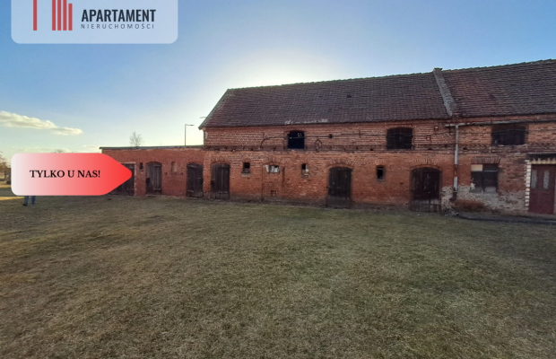 DZIAŁKA Z ZABUDOWANIAMI W CENTRUM OSIEKA NAD NOT.