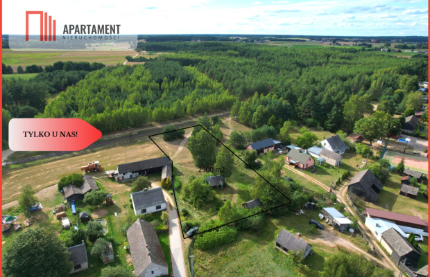 Działka budowlana z drewnianym domkiem.Tylko u nas