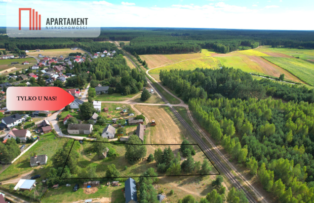 Działka budowlana z drewnianym domkiem.Tylko u nas