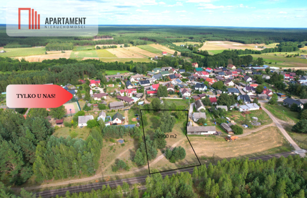 Działka budowlana z drewnianym domkiem.Tylko u nas