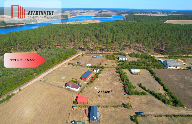 Działka rekreacyjna z domkiem letniskowym.