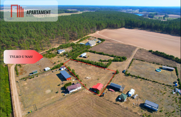Działka rekreacyjna z domkiem letniskowym.