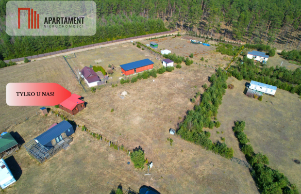 Działka rekreacyjna z domkiem letniskowym.