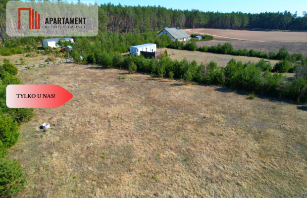 Działka rekreacyjna z domkiem letniskowym.
