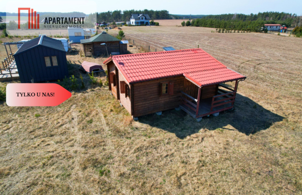 Działka rekreacyjna z domkiem letniskowym.