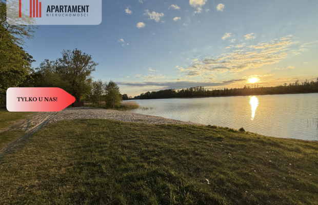 Działka nad jeziorem Raciąskim z domkiem.