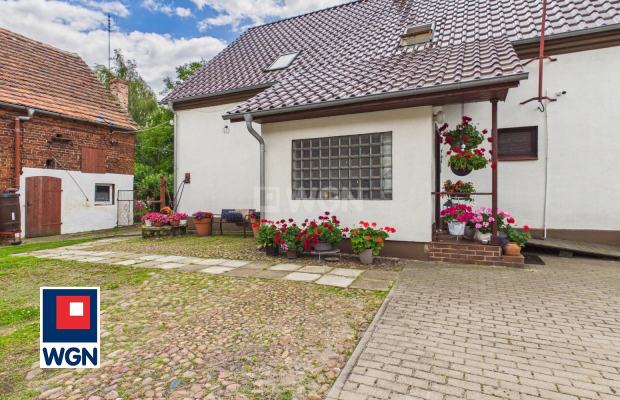 Przemków, dom wolnostojący 195 m2, działka o powierzchni 7 100 m2, zabudowania gospodarcze 350 m2, cena 899 000 zł, sprzedam. 
