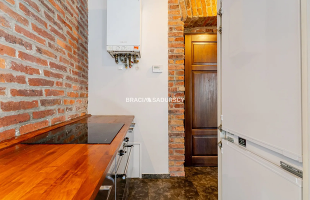 Dwupokojowy apartament z historycznym charakterem