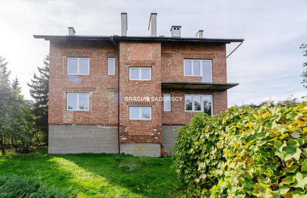 budynek| 409,95 m² |  działka 1056 m² | inwestycja